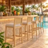 Cane back bar stools at a hotel pool bar