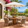 Market umbrella over a teak dining table on a villa terrace