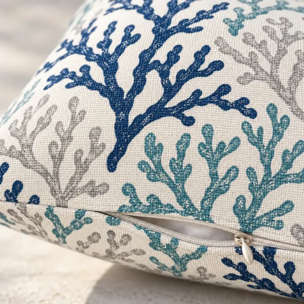 Close-up of coral print outdoor fabric and zipper