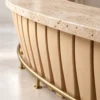 Close-up of travertine bar top, plywood staves and brass foot rail