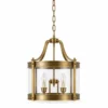 Short brass cylinder glass lantern pendant with four candle lights
