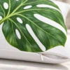 Close-up of monstera leaf print and zipper