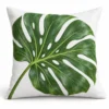 Monstera leaf outdoor pillow in green and white