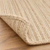 Close-up of braided jute texture and rug edge