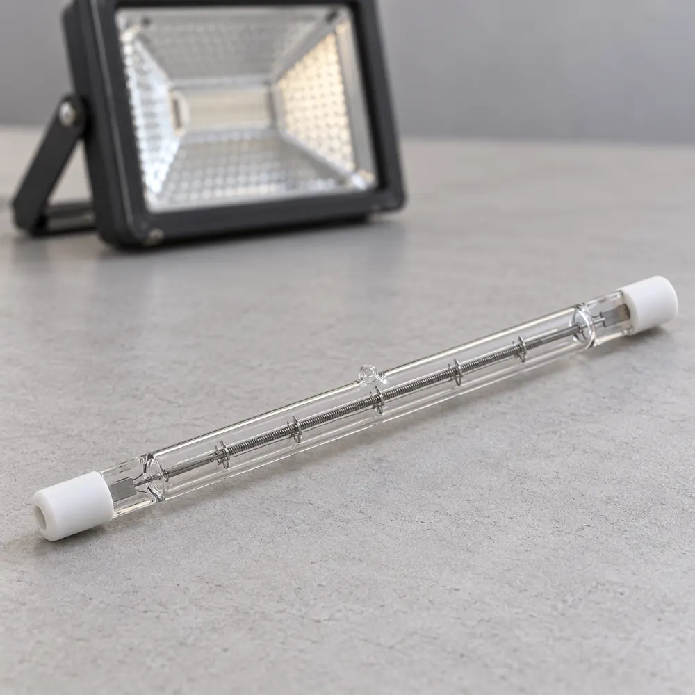 R7S halogen lamp beside a compatible fixture for illustrative reference