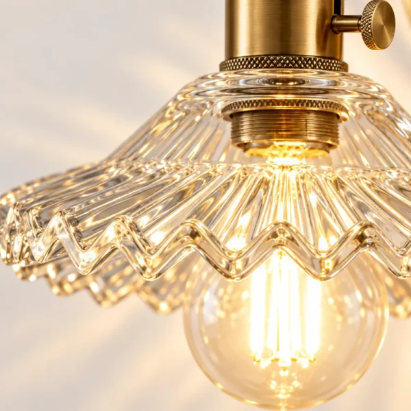 Close-up of ribbed glass shade with scalloped edge