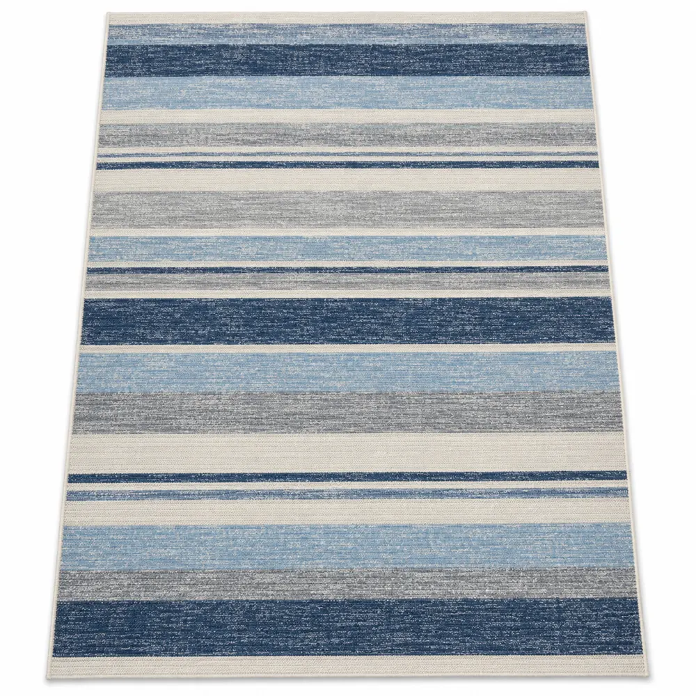 Blue and white striped indoor outdoor rug