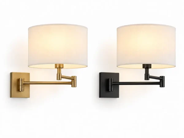 Swing arm wall sconce in brass finish and matte black