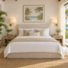 Pair of brass swing arm sconces beside a hotel guestroom bed
