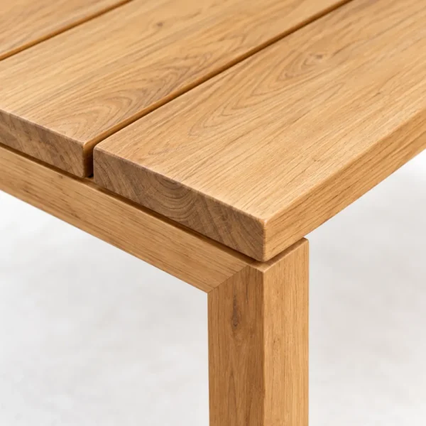 Close-up of teak side table planks and leg joint
