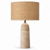 Travertine column table lamp with natural seagrass shade