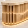 Close-up of travertine top and plywood slice front with LED light