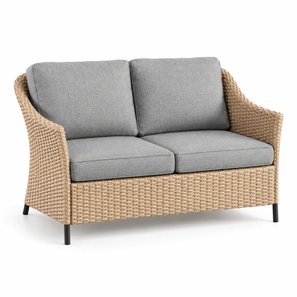 Woven wicker loveseat with grey cushions